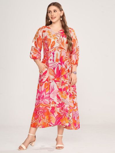 Long wide dress with leaves print in lipstick colors